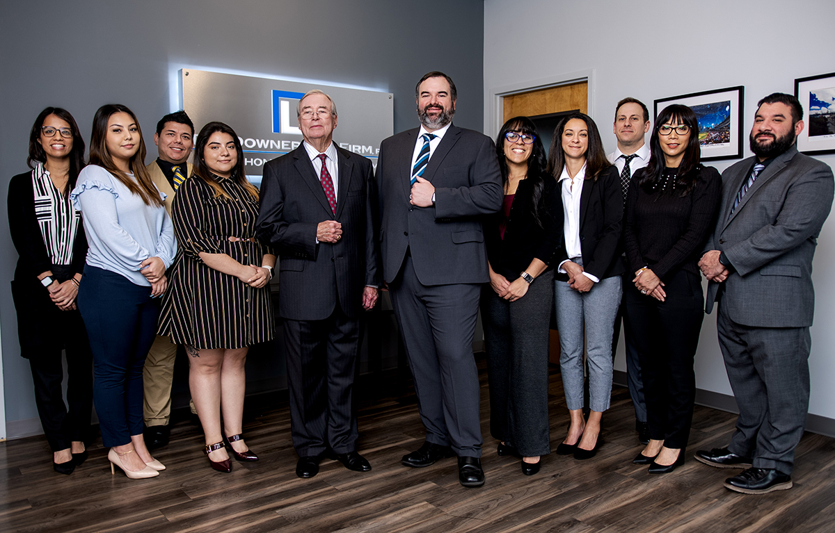 Group Photo Of Attorneys and Staff at The Downer Law Firm, P.A.